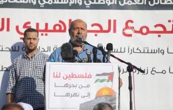 الحية خلال وقفة نظمتها الفصائل وسط مدينة غزة احتجاجا على زيارة بايدن (تصوير: محمود أبو حصيرة)