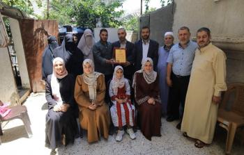 جانب من تكريم الشقيقات الحافظات للقرآن الكريم