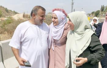 آمنة اشتيه ووالديها