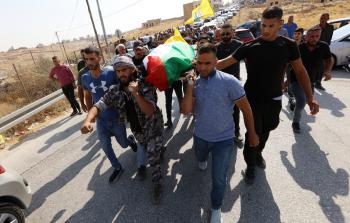 جانب من تشييع جثمان الشهيد موسى أبو محاميد (فلسطين أون لاين)