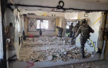 خلال عملية هدم مزل الشهيد عدي التميمي