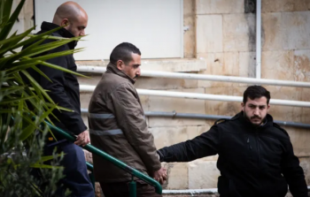 الأسير المقدسي سند طرمان في أثناء عرضه على محكمة الاحتلال