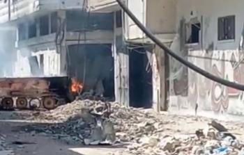 صورة لناقلة الجند المتفحمة في حي الشجاعية