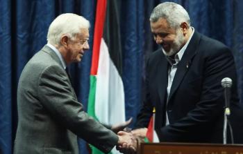 كارتر والشهيد القائد إسماعيل هنية وقت زيارته لغزة