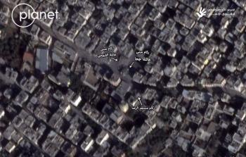 صورة القمر الصناعي تظهر ركام مبنى عائلة جحا والمباني المحيطة به بعد الهجوم بتاريخ 10 ديسمبر 2023.© 2025 Planet Labs PBC