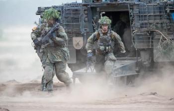 جنود ألمان في مناورة عسكرية مشتركة مع قوات ليتوانية (أسوشيتد برس)