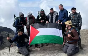 الرحالة يرون في رفع العلم الفلسطيني رسالة للعالم بوجود فلسطين على الخريطة (مواقع التواصل)