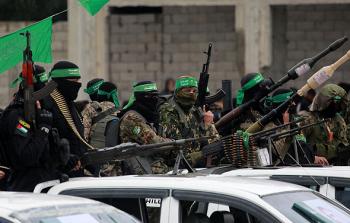 مقاتلين من كتائب القسام خلال عملية تبادل للأسرى العام الماضي