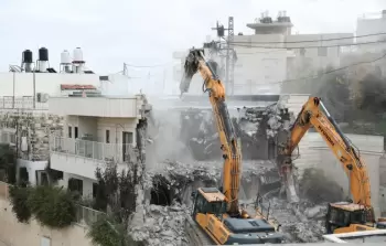 جرفات إسرائيلية تهدم منزلي فلسطيي في القدس (أرشيف)
