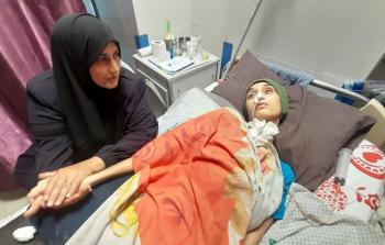 بَتول المشهراوي ترقد على سرير المرض منذ أشهر طويلة عاجزة عن الكلام والحركة