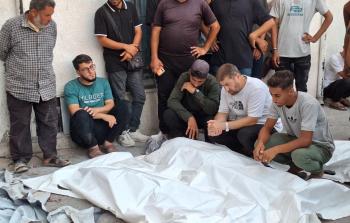 شهداء المجزرة الإسرائيلية في ميناء غزة أمس (تصوير/ محمود أبو حصيرة)