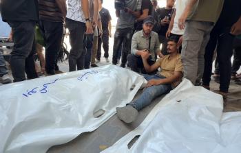 جانب من تشييع جثامين الشرطة في مجزرة أمس (تصوير محمود أبو حصيرة)