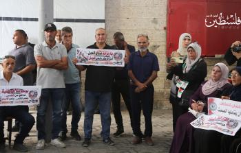 الاعتصام الأسبوعي الذي تنظمه لجنة الأسرى للقوى الوطنية والإسلامية وأهالي الأسرى وعدد من المُحرّرِين، (تصوير محمود أبو حصيرة)