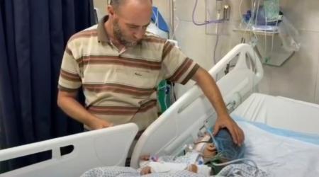 محمود عبد الله يتجرع مرارة الفقد ويصارع لإنقاذ طفلته الثانية