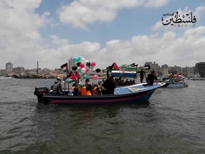 رسائل سياسية إلى البحر..   أهالي غزة يعبرون عن آمالهم بتحقيق الحرية البحرية لهم (5)