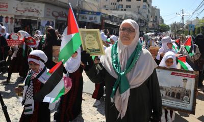 مسير قرآني لـ800 حافظة للقرآن الكريم شوارع مدينة غزة (17).jpg