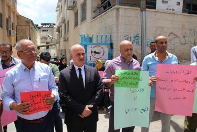 وقفة احتجاجية رفضا لتقليص خدمات وكالة غوث وتشغيل اللاجئين الفلسطينيين الأونروا (1).jpg