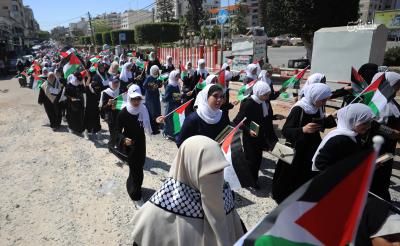 مسير قرآني لـ800 حافظة للقرآن الكريم شوارع مدينة غزة (21).jpg