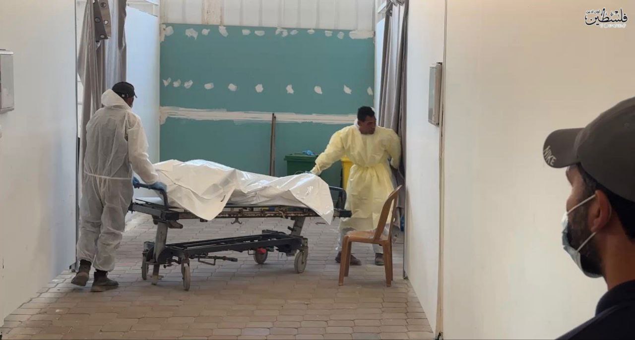 بالصور الاحتلال يسلم جثامين 15 شهيدا من غزة ضمن صفقة التبادل