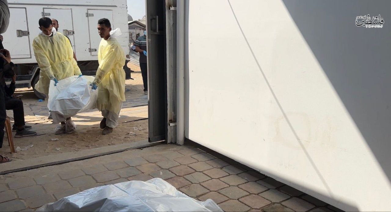 بالصور الاحتلال يسلم جثامين 15 شهيدا من غزة ضمن صفقة التبادل