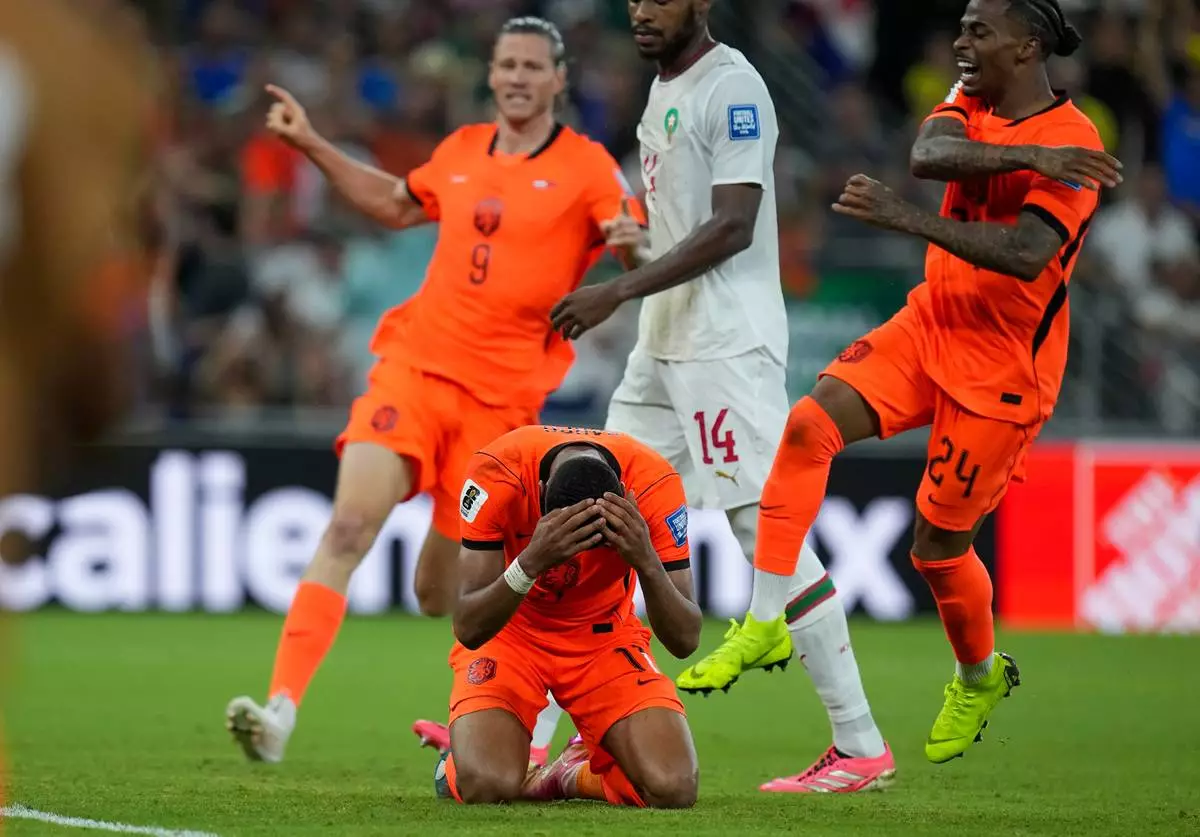 9187f746b2f53ff591287ac59c1f02f0_APTOPIX_Morocco_Netherlands_WCup_Soccer_465_6.jpg.webp